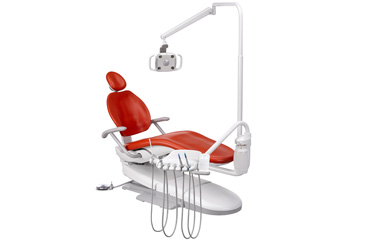 A-dec 300 dental chair with Paprika upholstery and other dental equipment