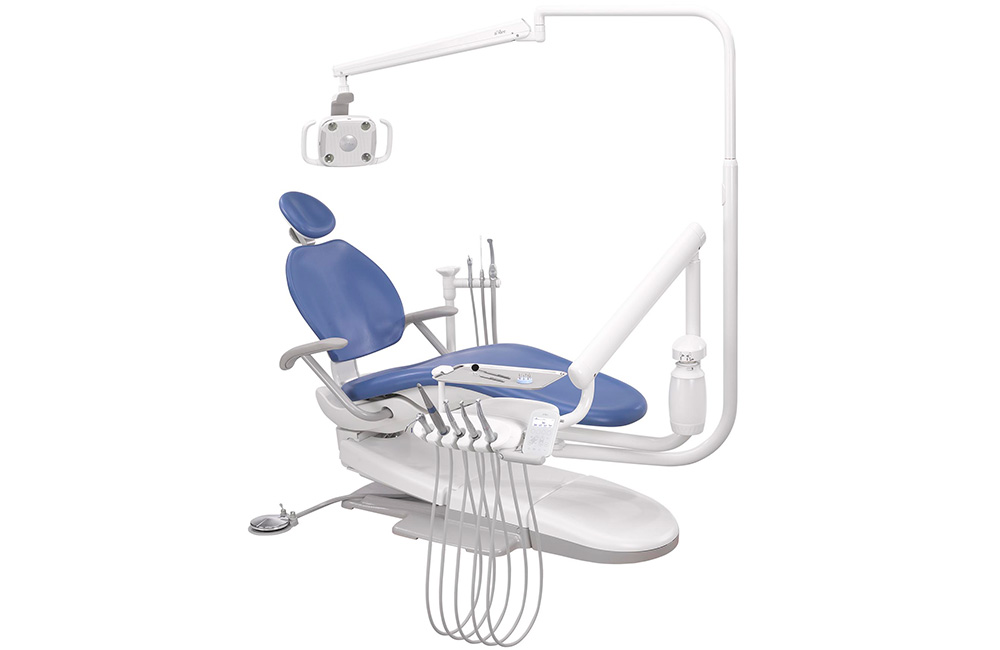 A-dec 300 dental chair with Sky Blue upholstery and other dental equipment