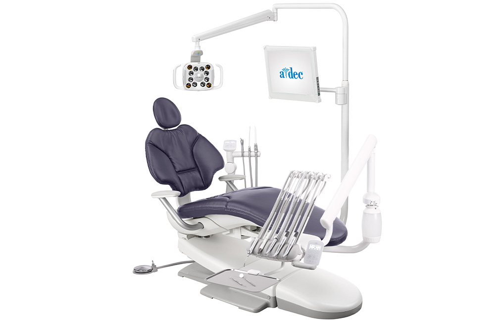 A-dec 400 dental chair with Plum upholstery and other dental equipment