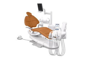 A-dec 500 dental chair with Apricot upholstery, monitor mount, and other dental equipment