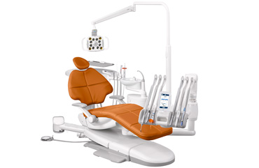 A-dec 500 dental chair with Apricot upholstery and other dental equipment